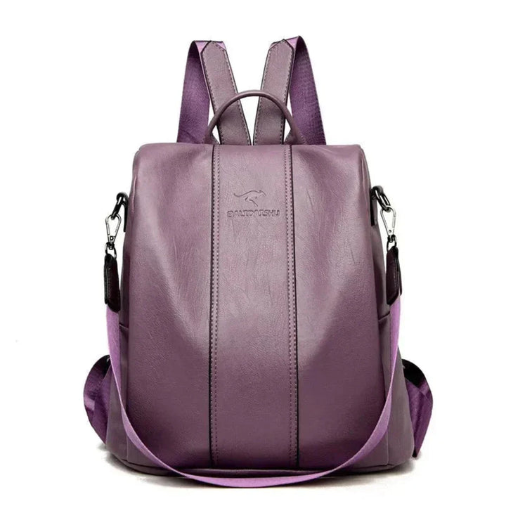 Sleek black women's anti-theft backpack, easily converts to a shoulder bag, great for commuting.
