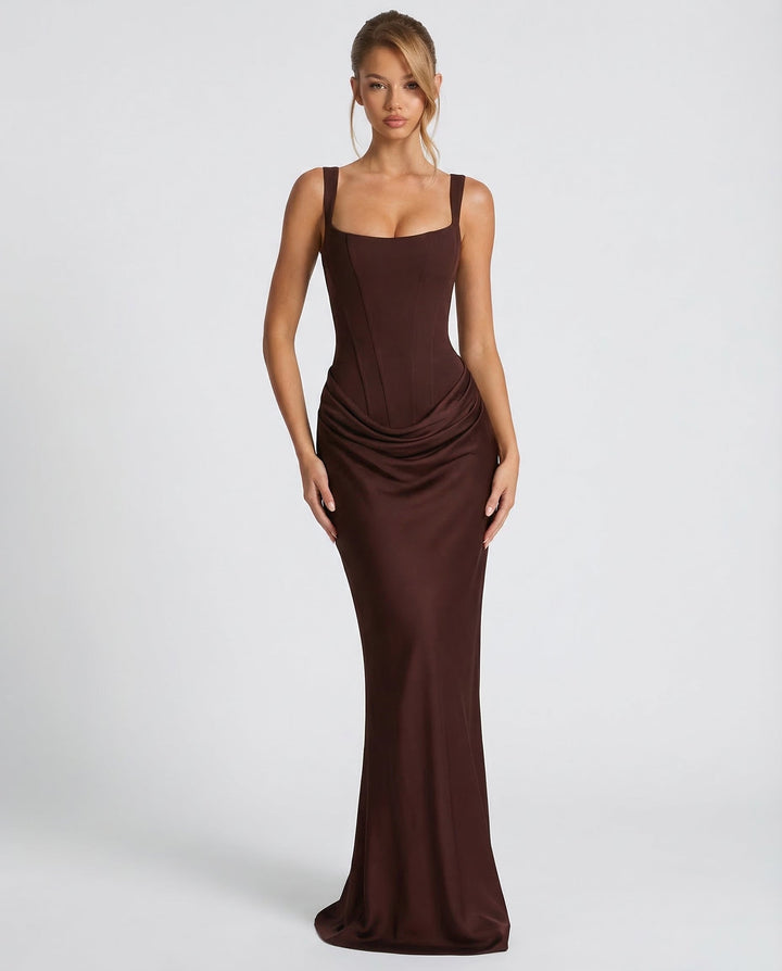 Sculpted women's sleeveless corset maxi dress with a flattering draped waist, ideal as a party or evening gown.