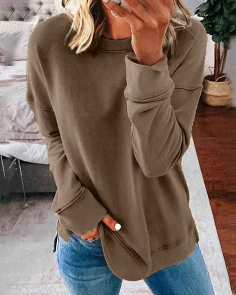 Relaxed fit women's top, perfect for casual wear, blending style and comfort seamlessly.