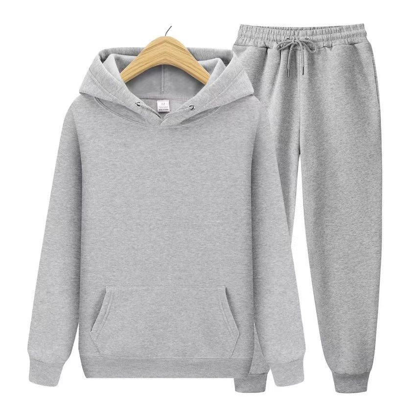 Stylish women's hooded sweatshirt, part of a comfy jogger set. Relaxed fit & soft material.