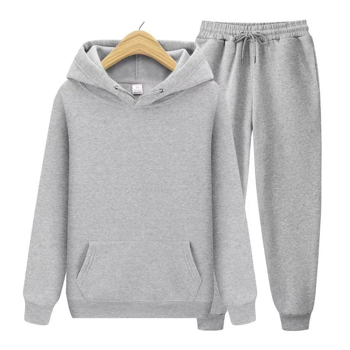 Stylish women's hooded sweatshirt, part of a comfy jogger set. Relaxed fit & soft material.