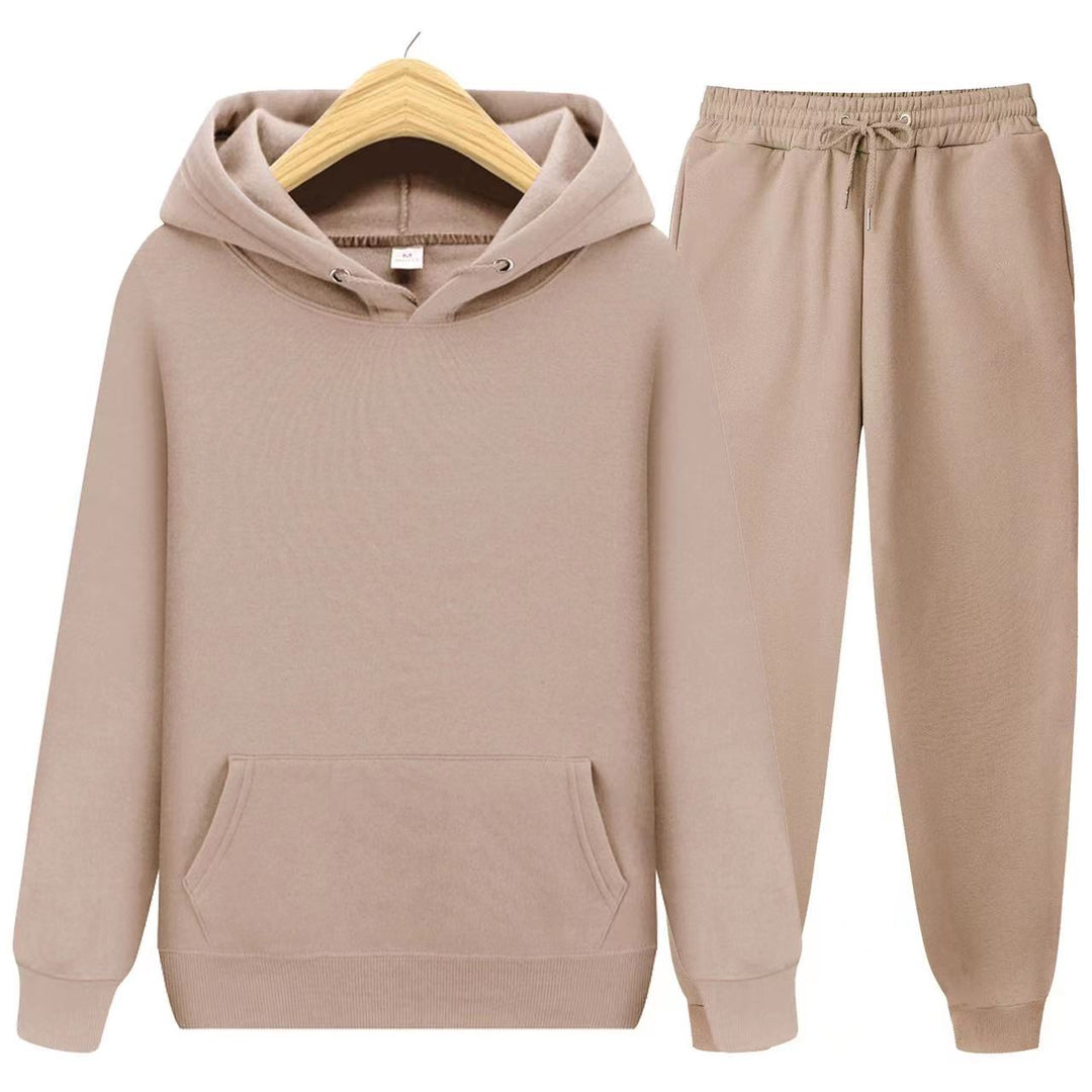 Model wearing a plush women's loungewear set: hoodie & joggers, for ultimate comfort & style.