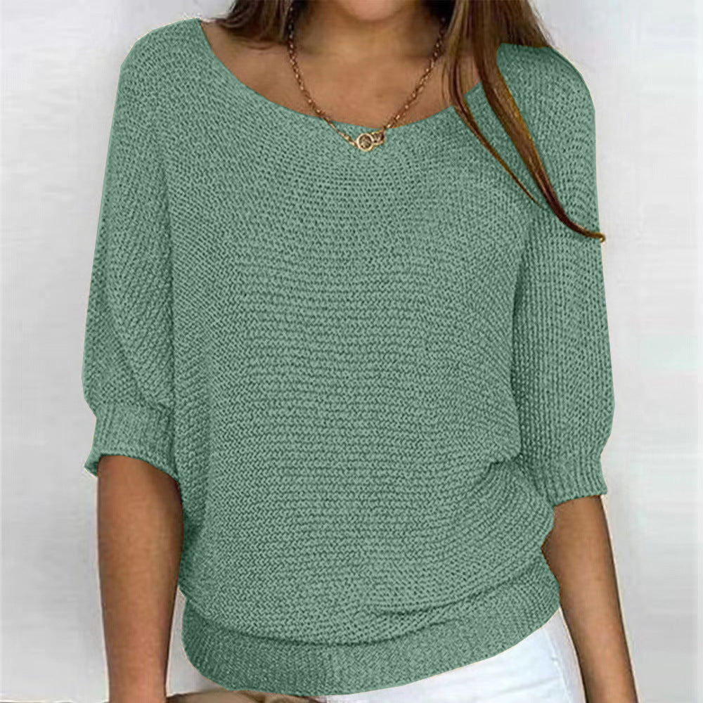 Stylish women's long-sleeve sweater, a versatile and elegant knit top.