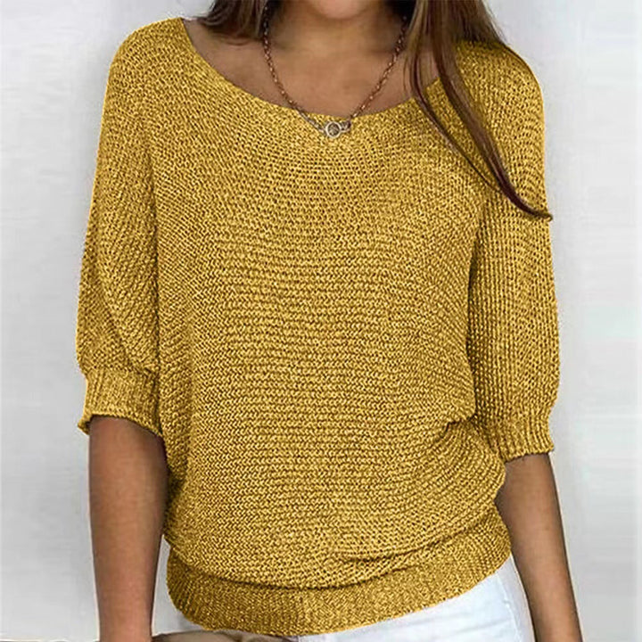 Comfortable women's knit pullover, an essential for winter fashion & soft wear.
