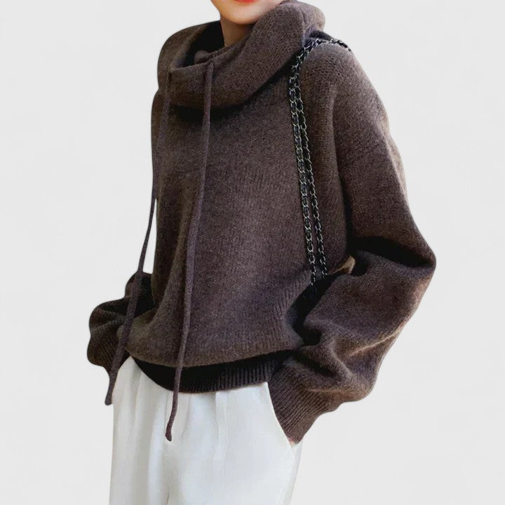 Stylish women's drawstring cowl neck pullover. Soft, oversized, long sleeve for cozy fall and winter fashion.