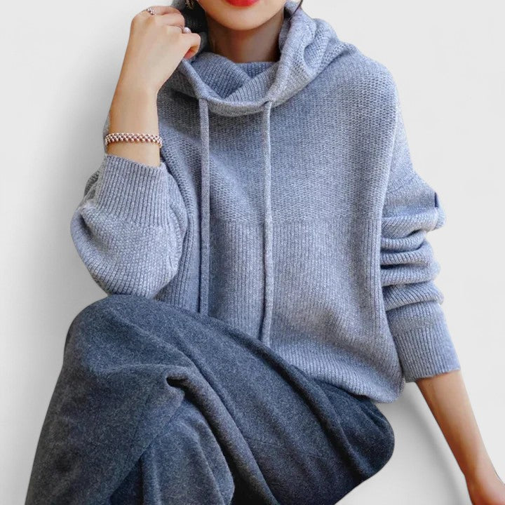 Chic women's oversized cowl neck sweater. Drawstring detail, long sleeve, comfortable for fall & winter fashion.