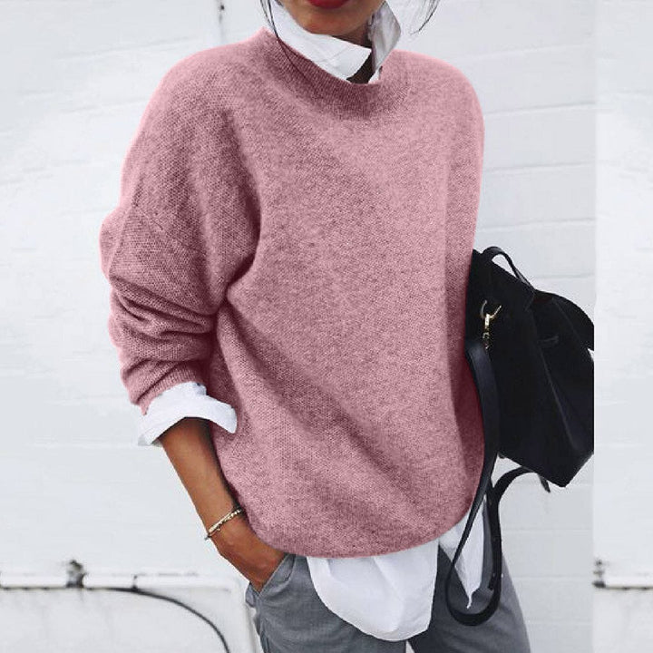 Elegant women's crew neck pullover sweater, offering warm and cozy comfort. A versatile long-sleeve top for winter fashion.
