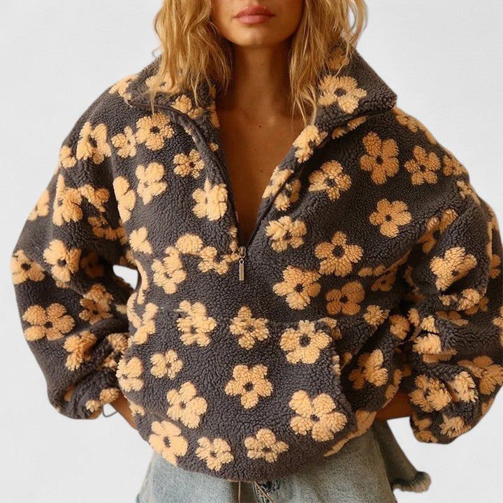Women's cozy floral quarter-zip pullover sweater, perfect for fall and winter comfort and style.