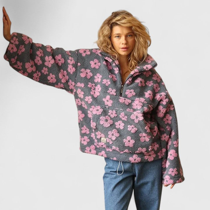 Chic women's oversized floral quarter-zip pullover, a stylish and warm long-sleeve sweater for casual wear.