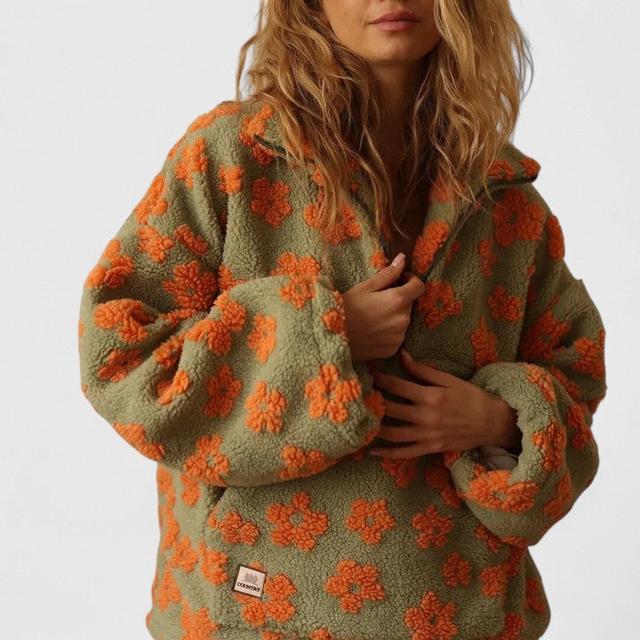 Warm and stylish women's floral quarter-zip pullover sweater, featuring a beautiful design for cozy fall and winter outfits.
