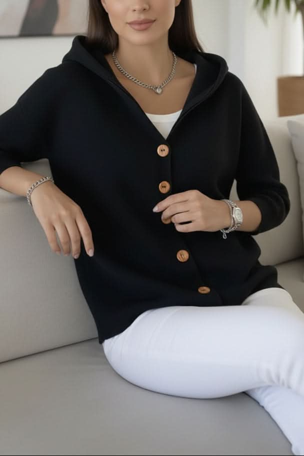 Women's long sleeve hooded knit cardigan, offering cozy comfort and relaxed style.