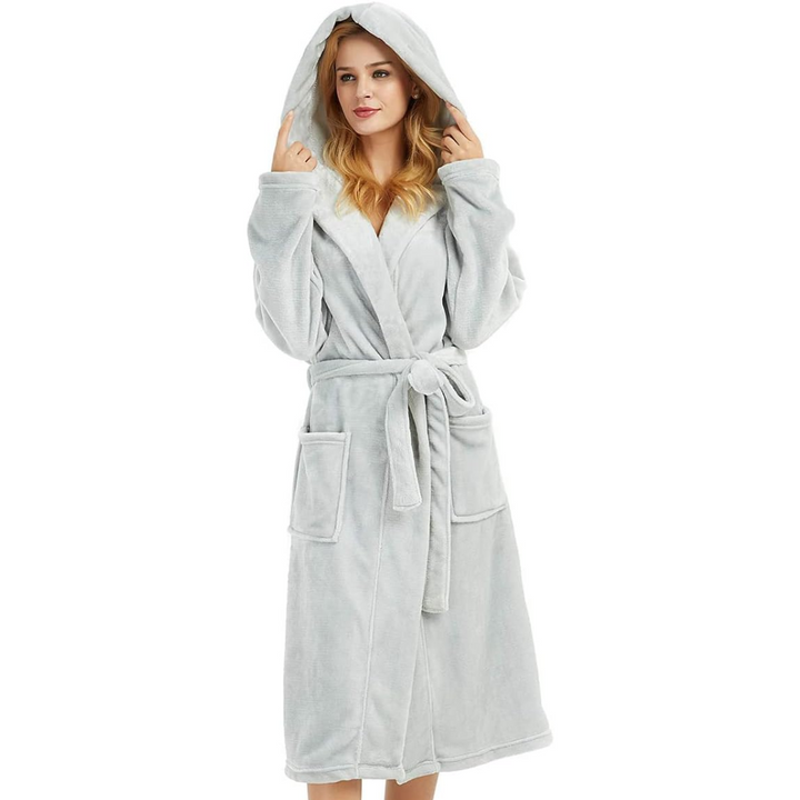 Plush women's hooded loungewear robe, soft and warm. Ideal for cozy relaxation and sleepwear.