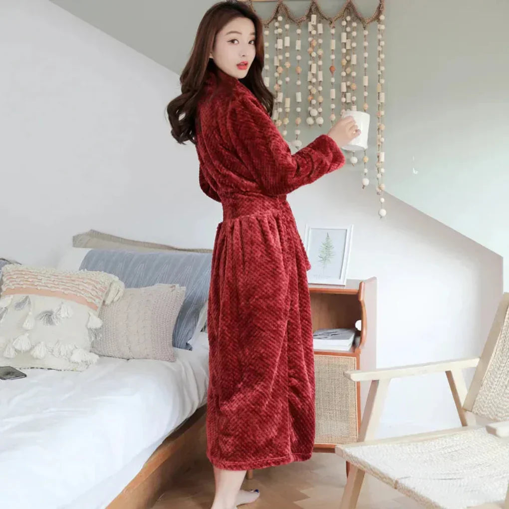 Comfortable women's soft plush hooded robe, an essential for cozy homewear and relaxation.