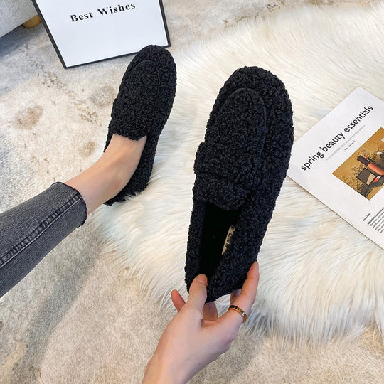 New women's cozy loafer slippers, soft & warm indoor footwear for luxurious home relaxation.