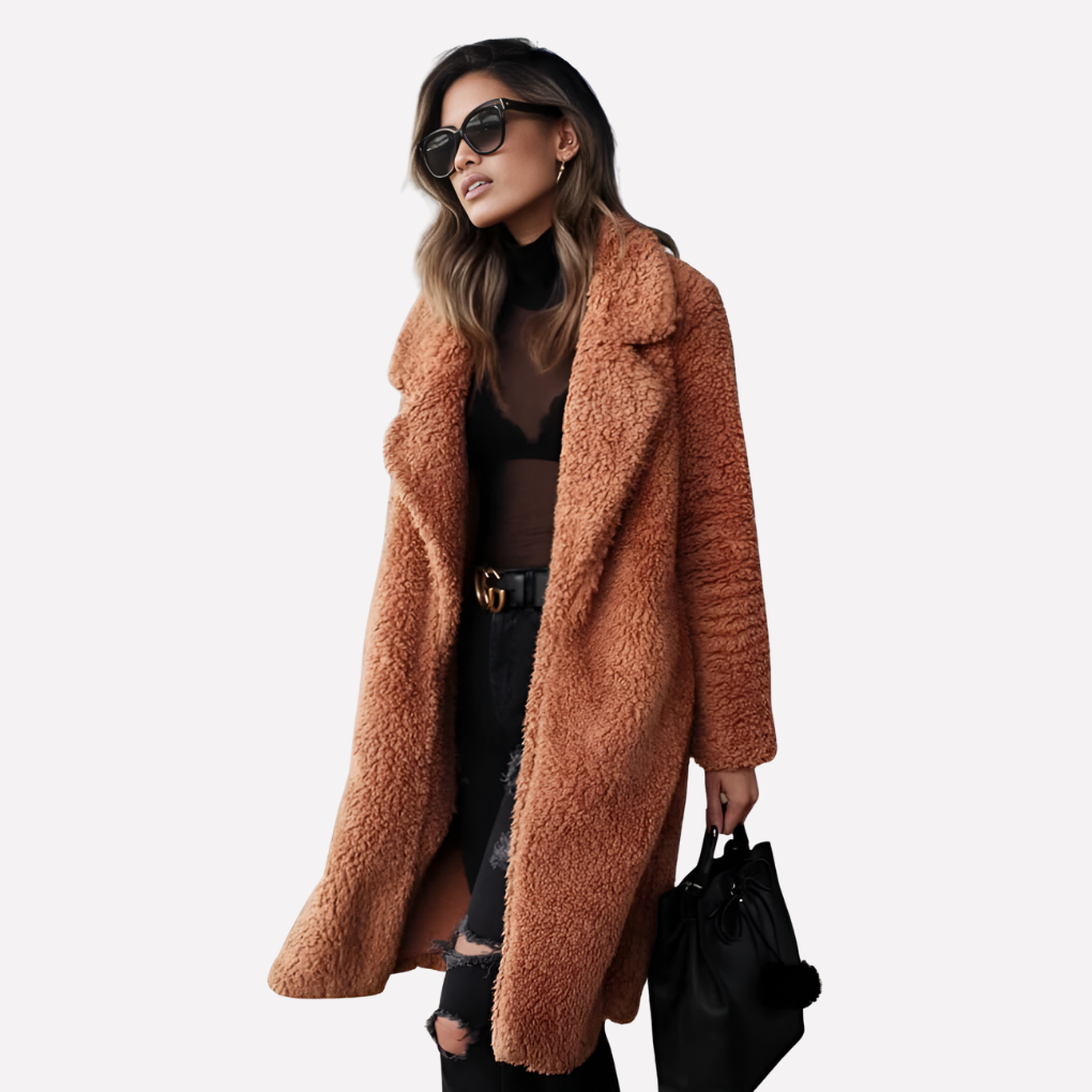Chic women's longline teddy coat in soft fabric, ideal for fall & winter fashion. Comfortable oversized fit.