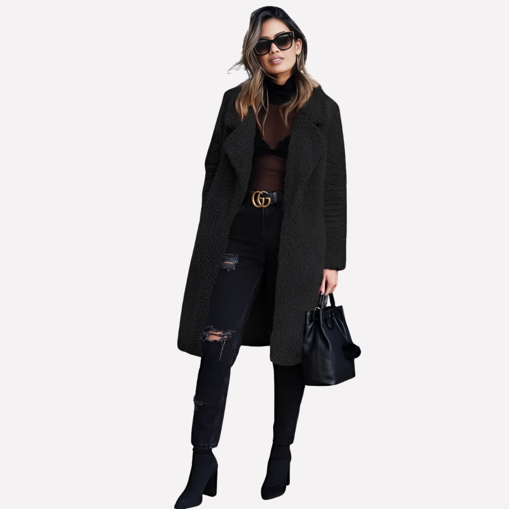 Warm longline teddy coat for women. Cozy oversized jacket, perfect for fall and winter fashion. Chic design.