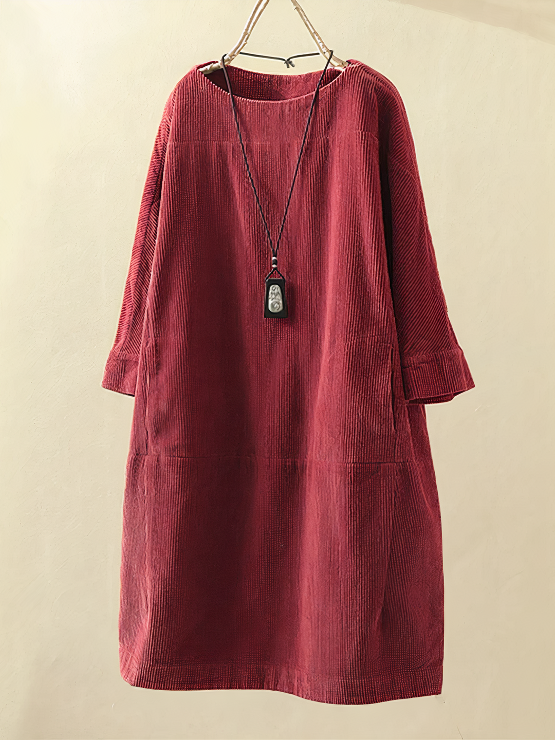 Flattering women's midi dress with convenient pockets, elbow sleeves & round neck. Great for cozy fall outfits.