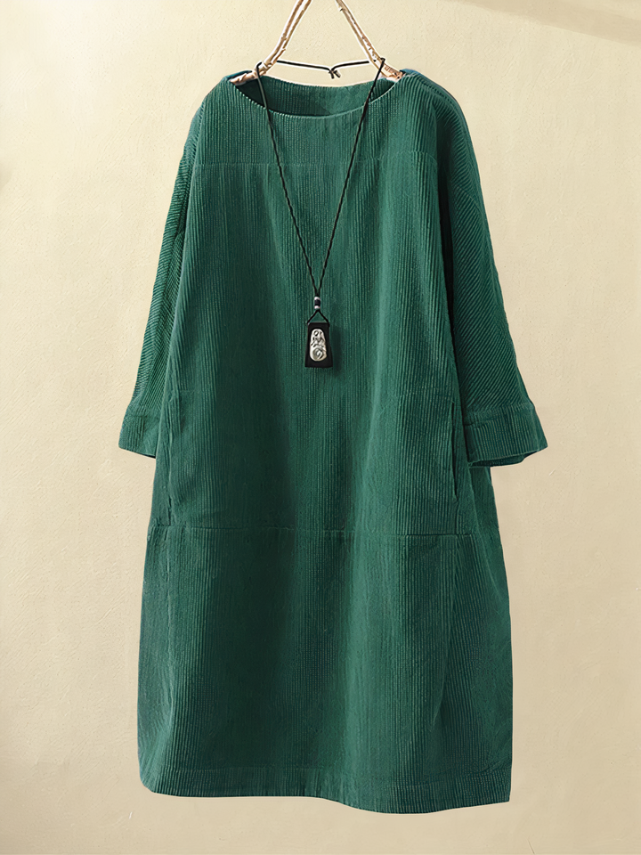 Cozy women's midi dress, perfect for winter & fall. Features practical pockets, elbow sleeves & a comfortable fit.