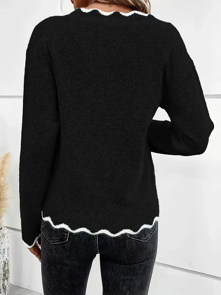 Green relaxed fit women's long sleeve V-neck top, cozy and casual.