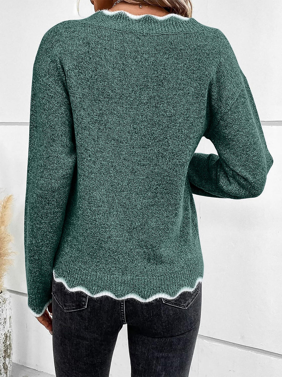 Cozy women's casual pullover with a unique notch V-neck design.