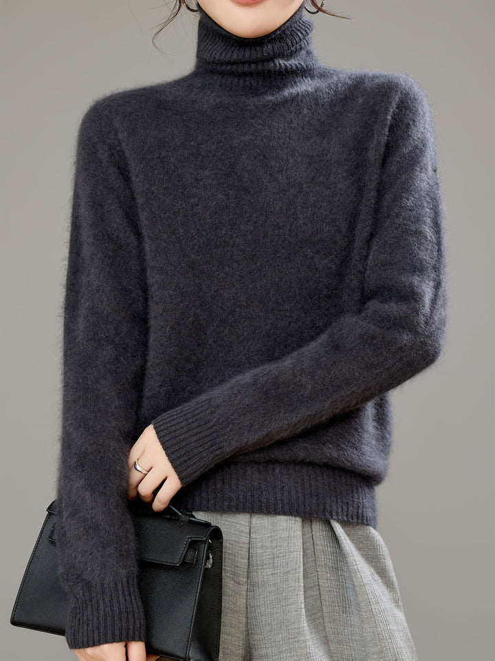 Luxurious women's cozy turtleneck sweater, an oversized design for ultimate warmth and style.