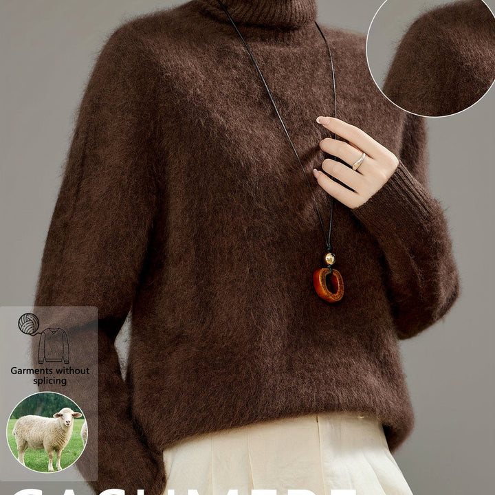 Sophisticated women's oversized turtleneck sweater, featuring a soft knit for cozy elegance.