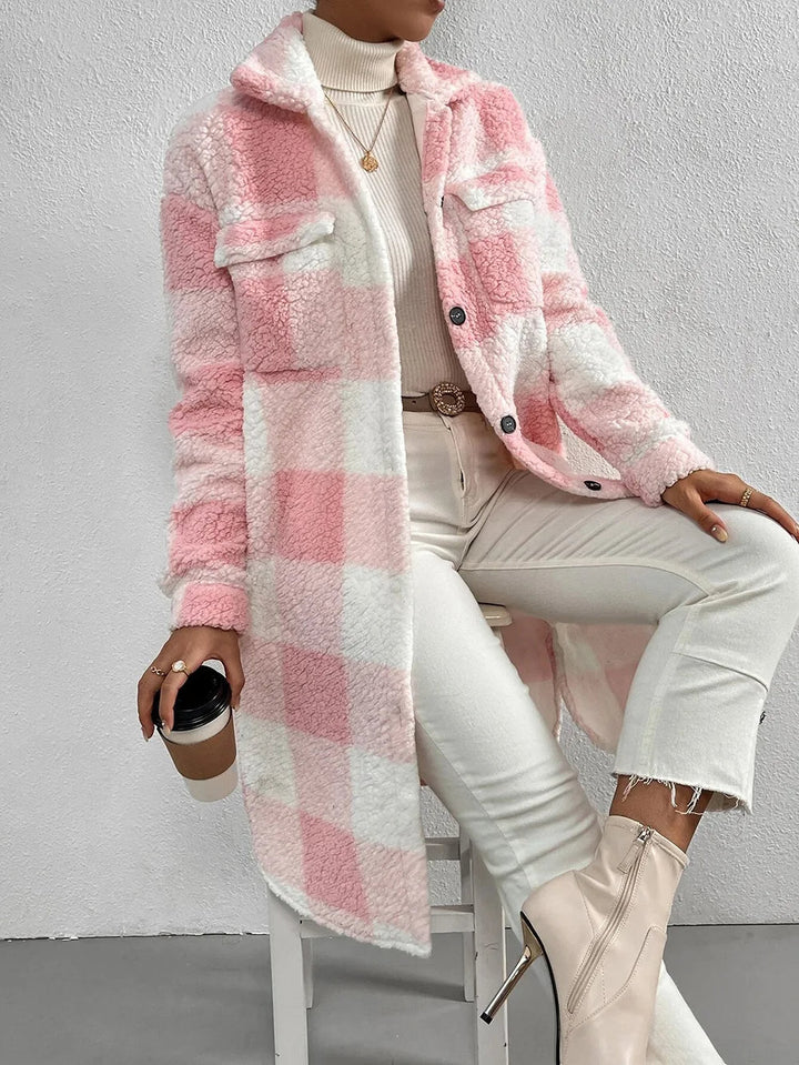 Comfortable women's plaid longline jacket with button closure. Stylish fall & winter outerwear.