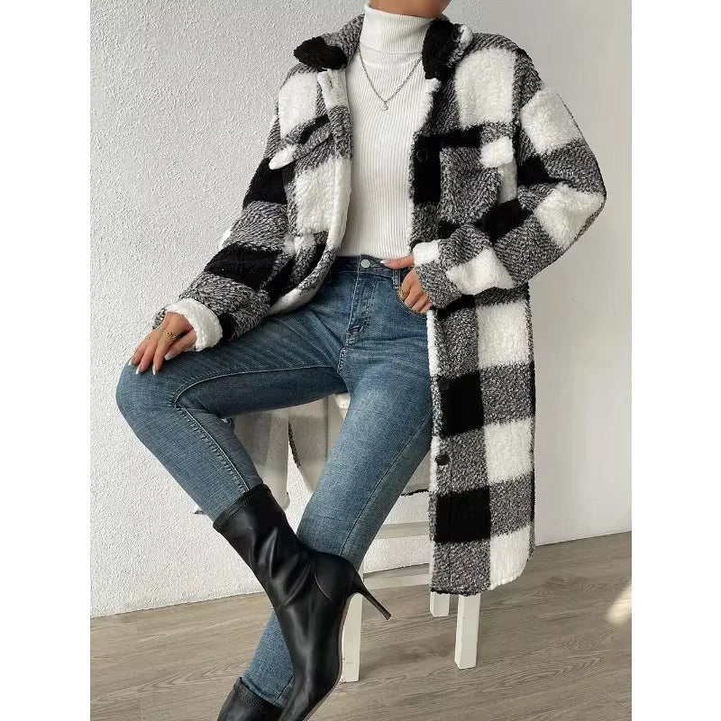Women's fall fashion: a cozy plaid longline jacket with button-up front. Chic outerwear for comfort.