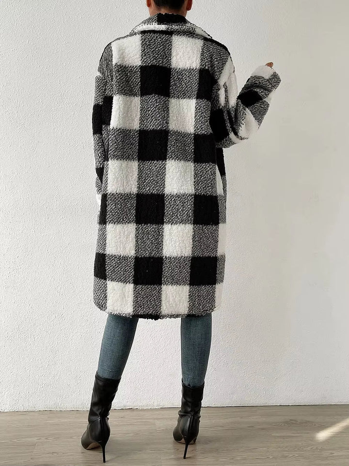 Women's button-up longline plaid jacket. Cozy & chic outerwear for chilly days. Fall/winter essential.