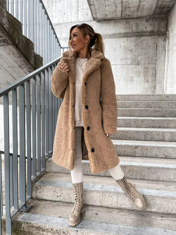 Women's cozy plush teddy longline coat. Perfect warm outerwear for winter & fall fashion.