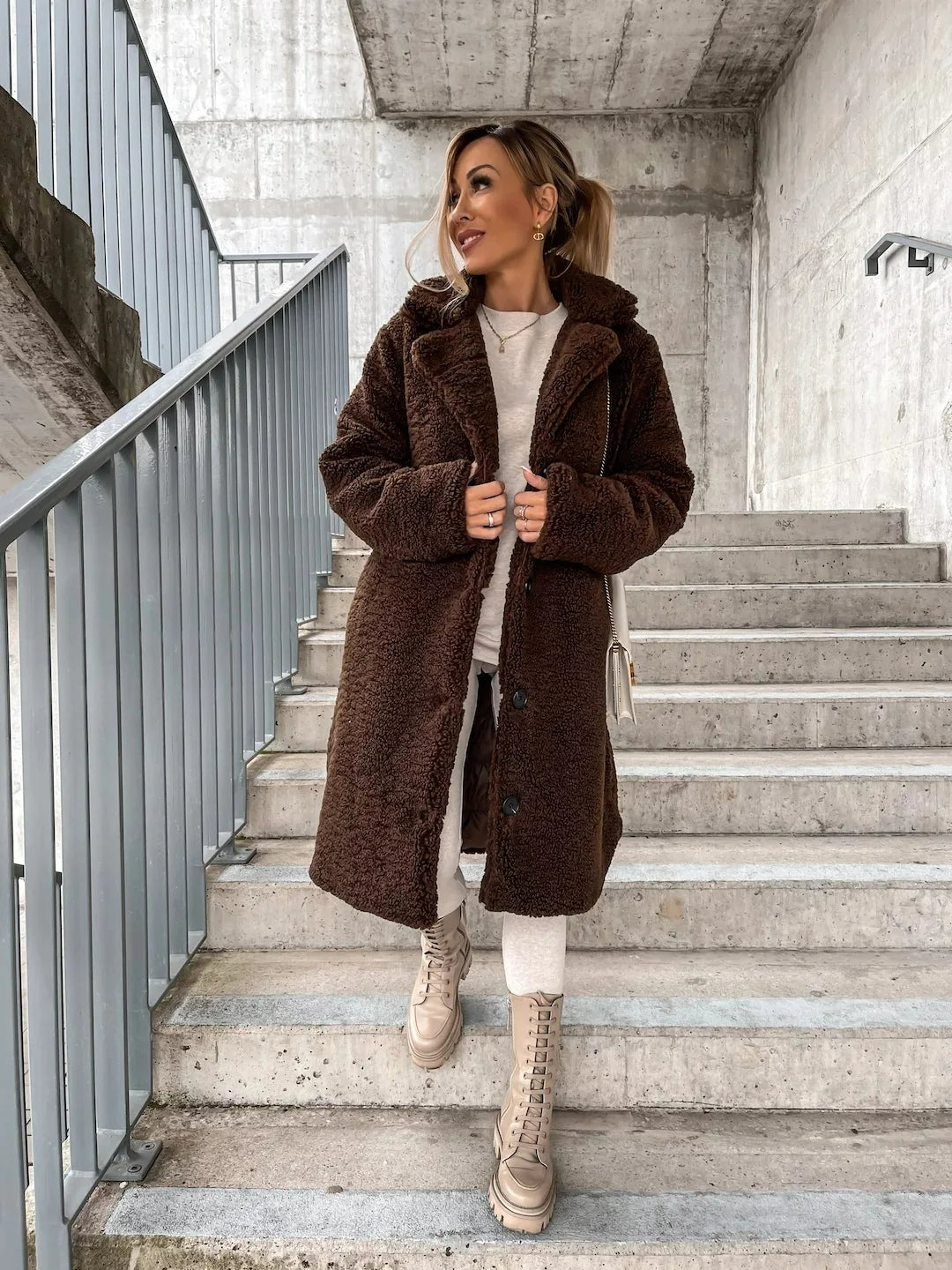 Trendy women's longline teddy coat. Chic and comfortable plush outerwear, a must-have for fall & winter.