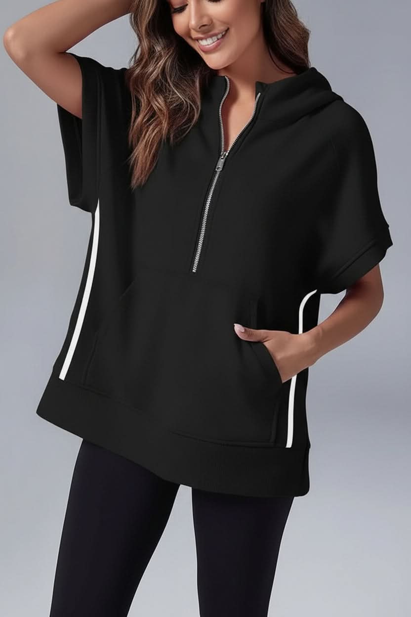 Gray women's short sleeve half-zip hoodie. Comfortable, relaxed fit pullover for casual or athleisure looks.