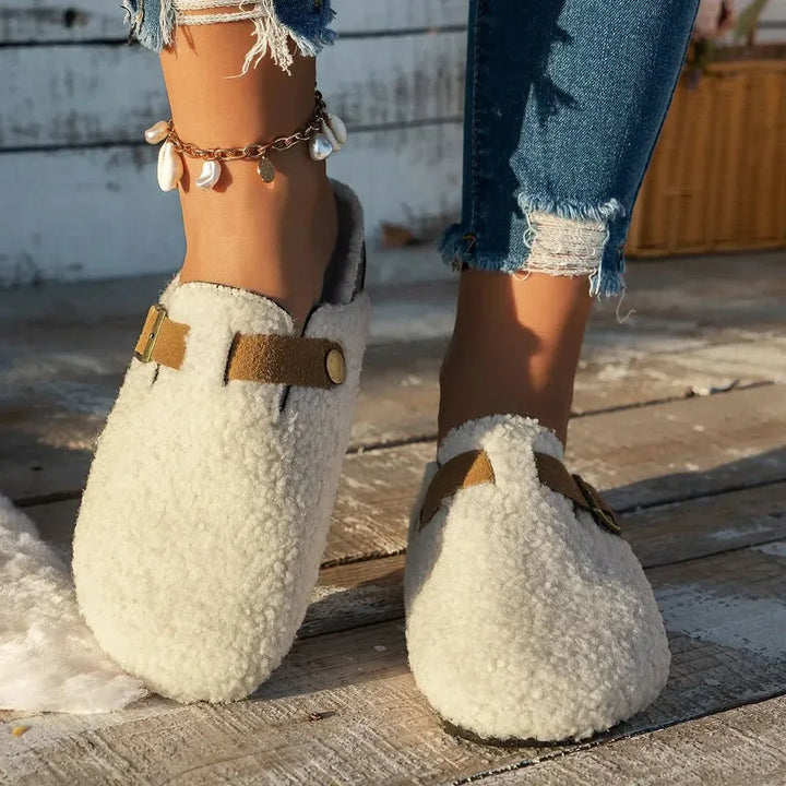Women's cozy slip-on mules for ultimate winter warmth and comfort. Ideal for home and lounge.