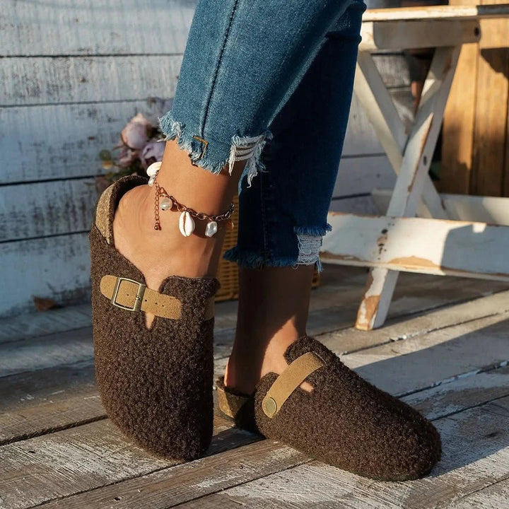 Ultra-cozy women's slip-on mules, designed for superior winter warmth and comfortable home relaxation.