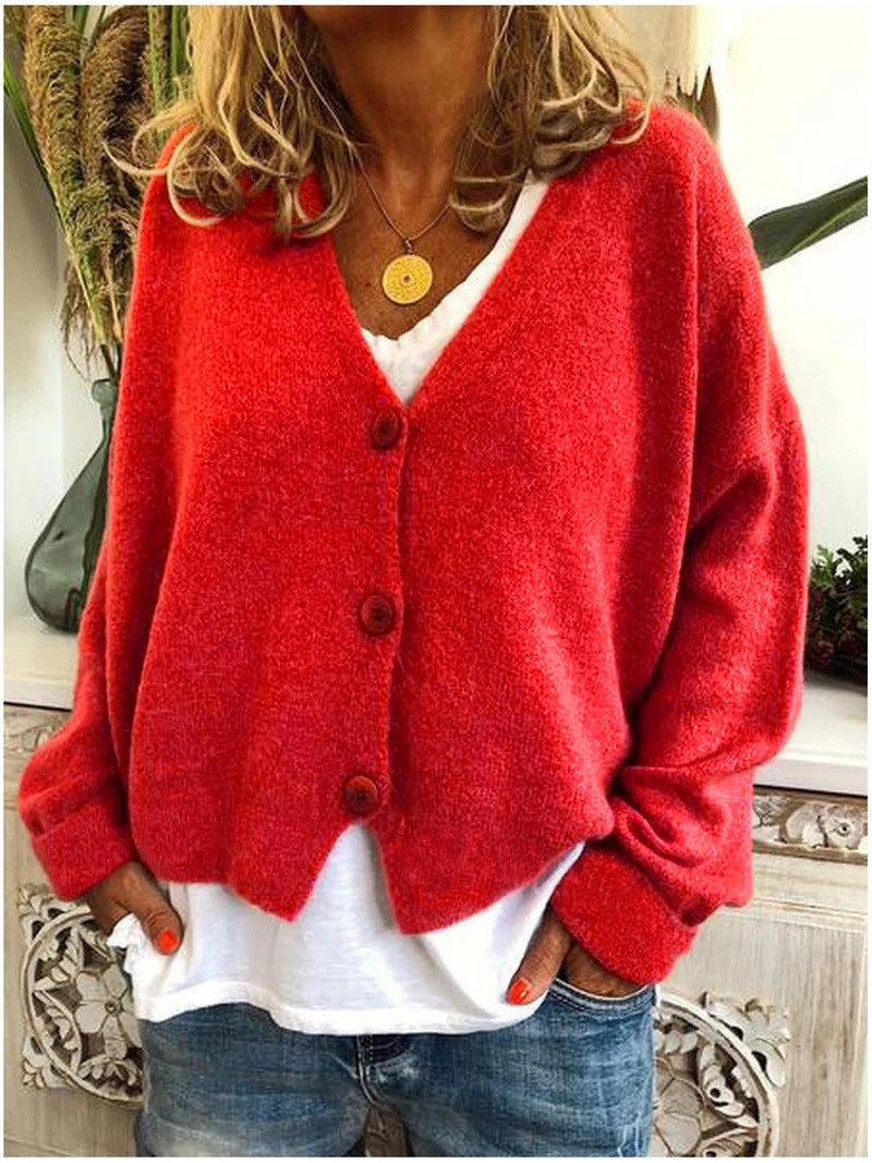 Women's relaxed fit soft knit cardigan, an essential layering piece for versatile autumn fashion.
