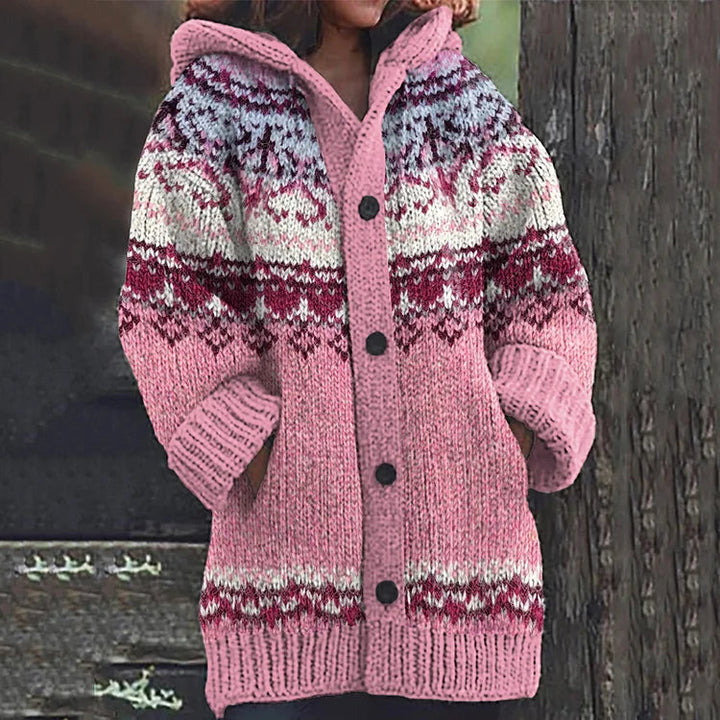 Stylish women's oversized cardigan in a soft multicolor knit. Cozy & warm winter fashion in blue, orange, green.