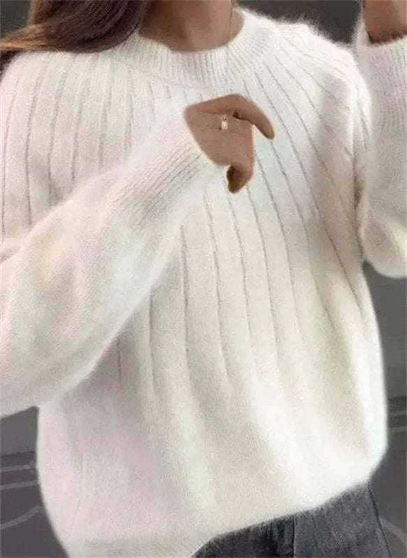 Comfortable women's textured knit sweater, a cozy long sleeve top for casual outfits. Ideal for fall warmth.