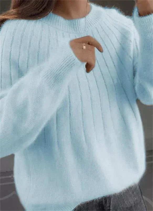 Soft women's cozy knit sweater with unique texture, offering ultimate comfort for fall & winter versatility.
