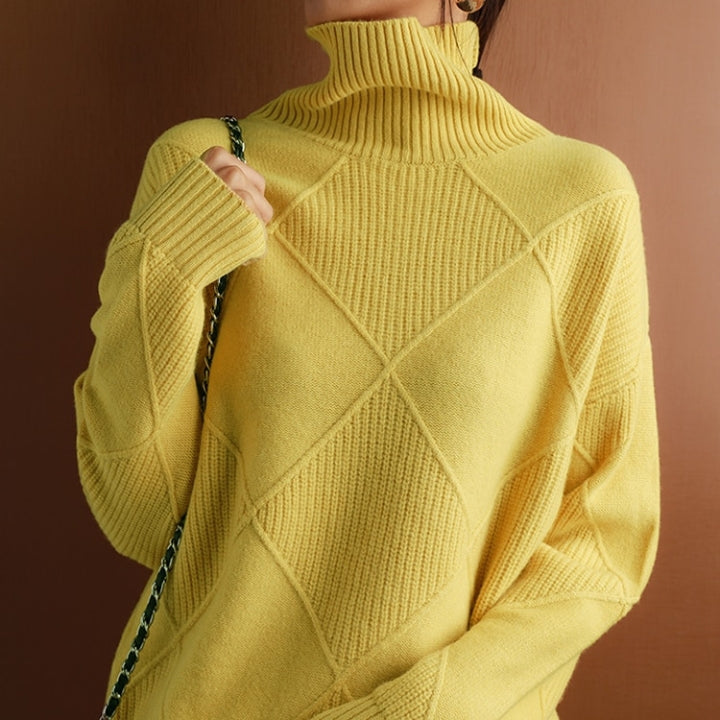 Women's cozy turtleneck sweater, perfect for effortless winter style & warmth.
