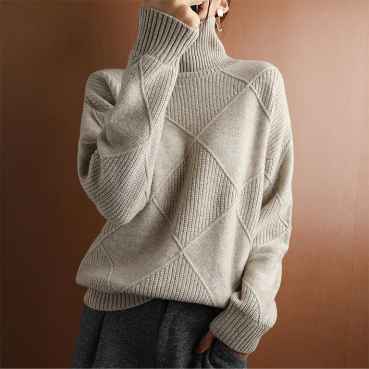 Everyday women's cozy sweater with a stylish turtleneck, essential winter apparel.