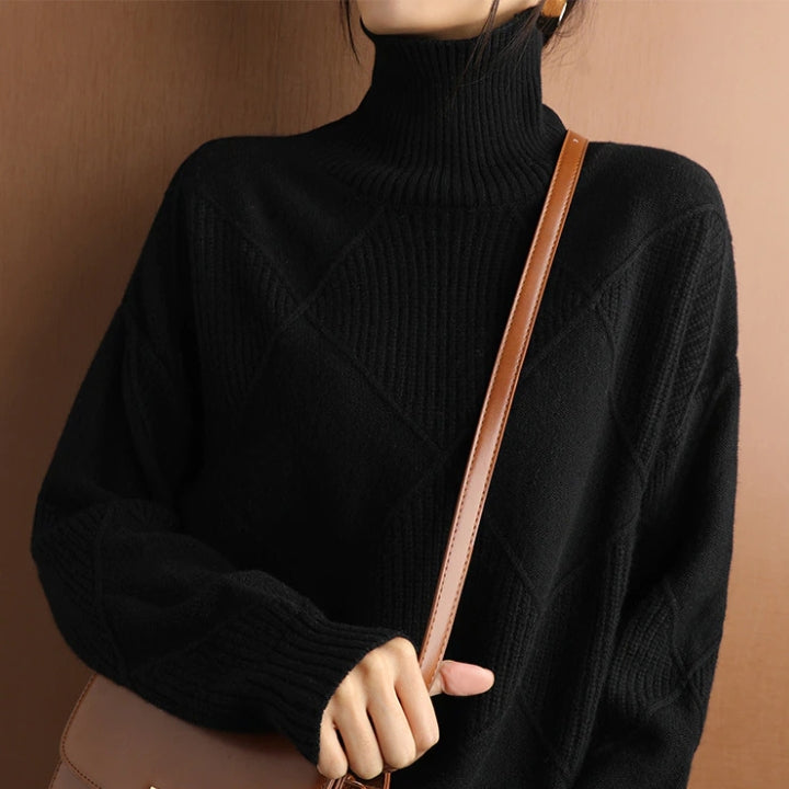 Comfortable women's sweater with a high turtleneck, essential for cold weather.