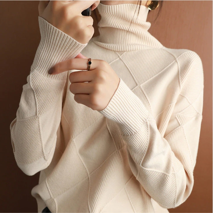 Classic women's turtleneck sweater, a versatile piece for winter wardrobe.