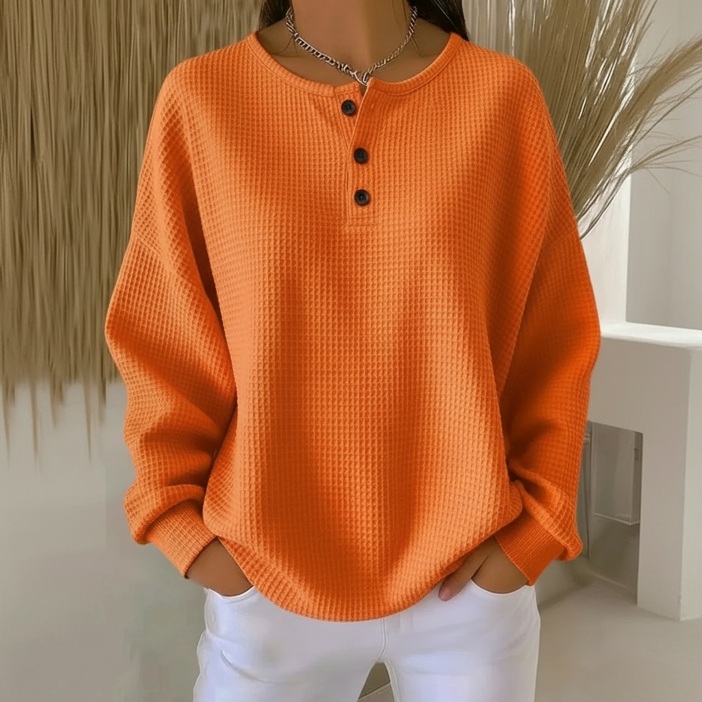 Women's cozy waffle knit sweater, relaxed fit, long sleeve pullover for casual everyday style.