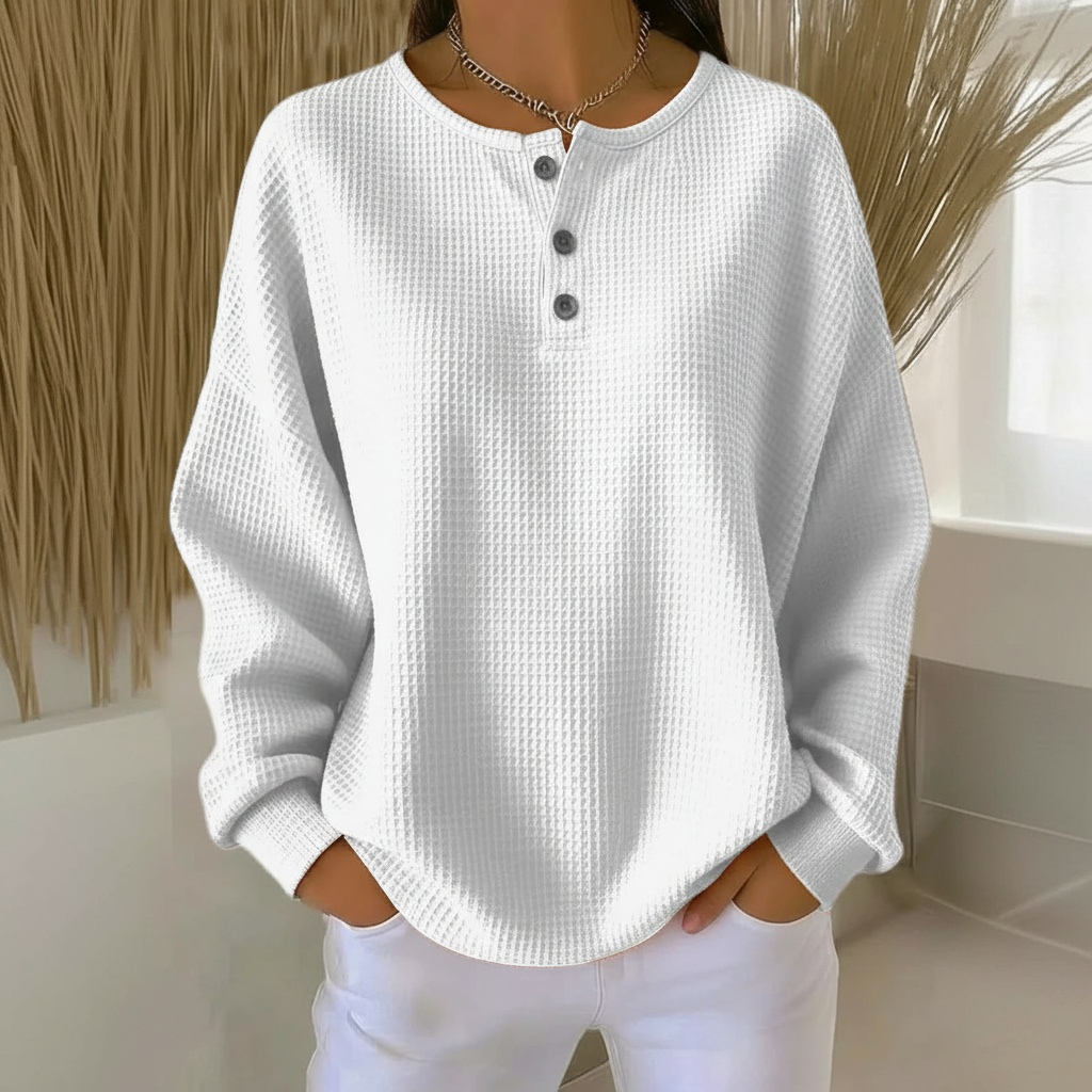 Comfortable women's waffle sweater, relaxed fit, perfect for versatile everyday and winter fashion.