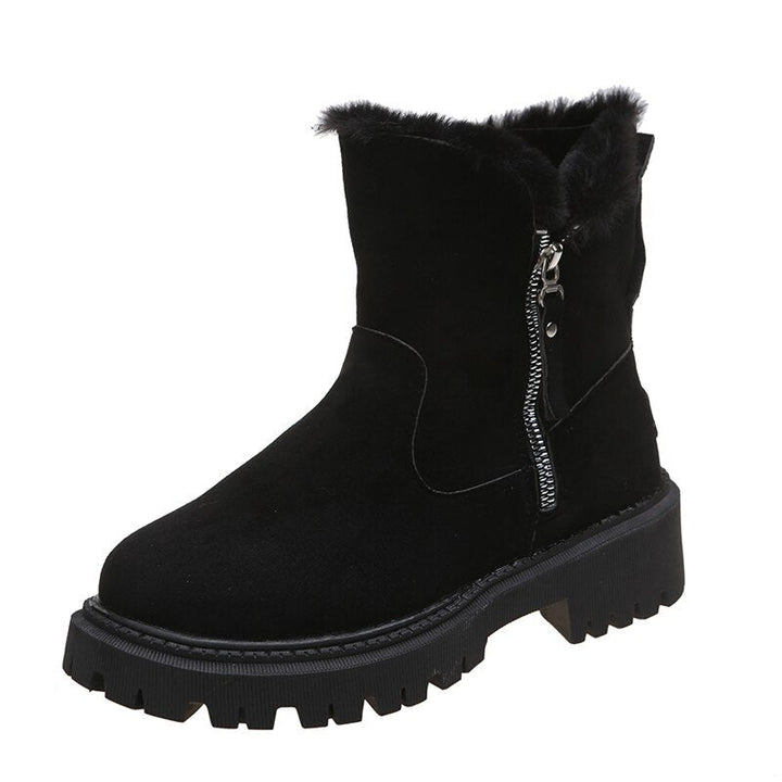 Stylish women's warm snow boots, offering cozy protection against cold weather, suitable for outdoor adventures.