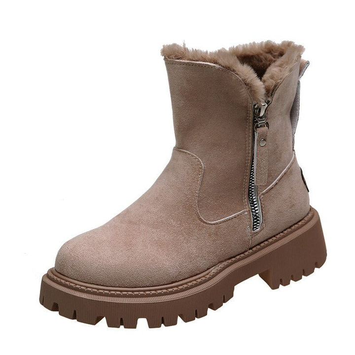 Women's warm, cozy, & comfortable winter snow boots. Insulated ankle footwear for cold outdoor protection.
