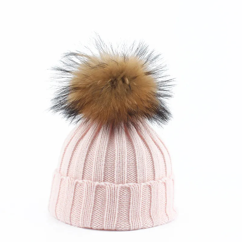 Ultra-cozy women's winter beanie hat with a fun pom-pom. Essential warm headwear for cold weather.