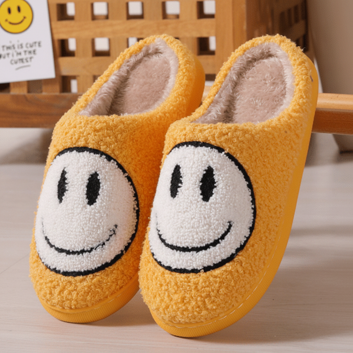 Detail of the thick non-slip sole on women's cozy winter smiley slippers, ensuring warm indoor comfort.