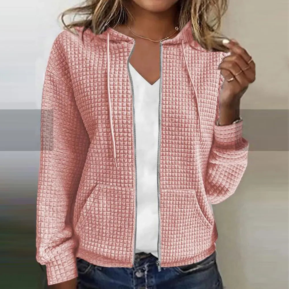 Women's cozy zip-front jacket, perfect for comfortable everyday layering. Stylish long-sleeve casual outerwear.