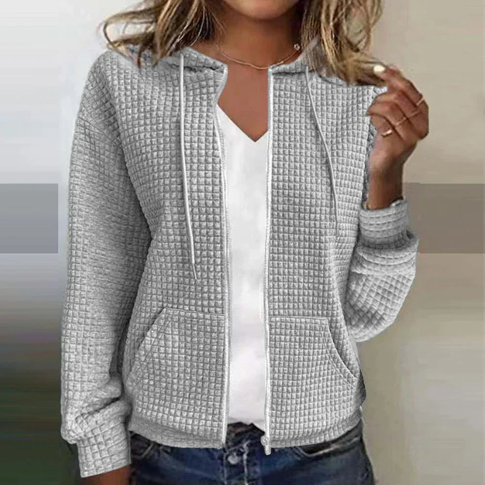 Versatile women's layering jacket with a zip-front. Cozy, stylish long-sleeve outerwear for casual comfort.
